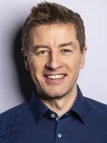 Steffen Reik, Portrait, lächelnd, Blick in Kamera